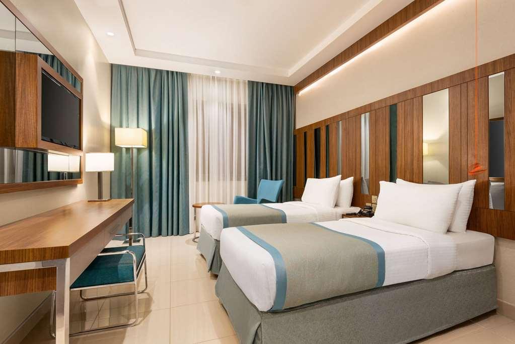 Ramada By Wyndham Makkah Zad Al Tayseer Мекка Номер фото