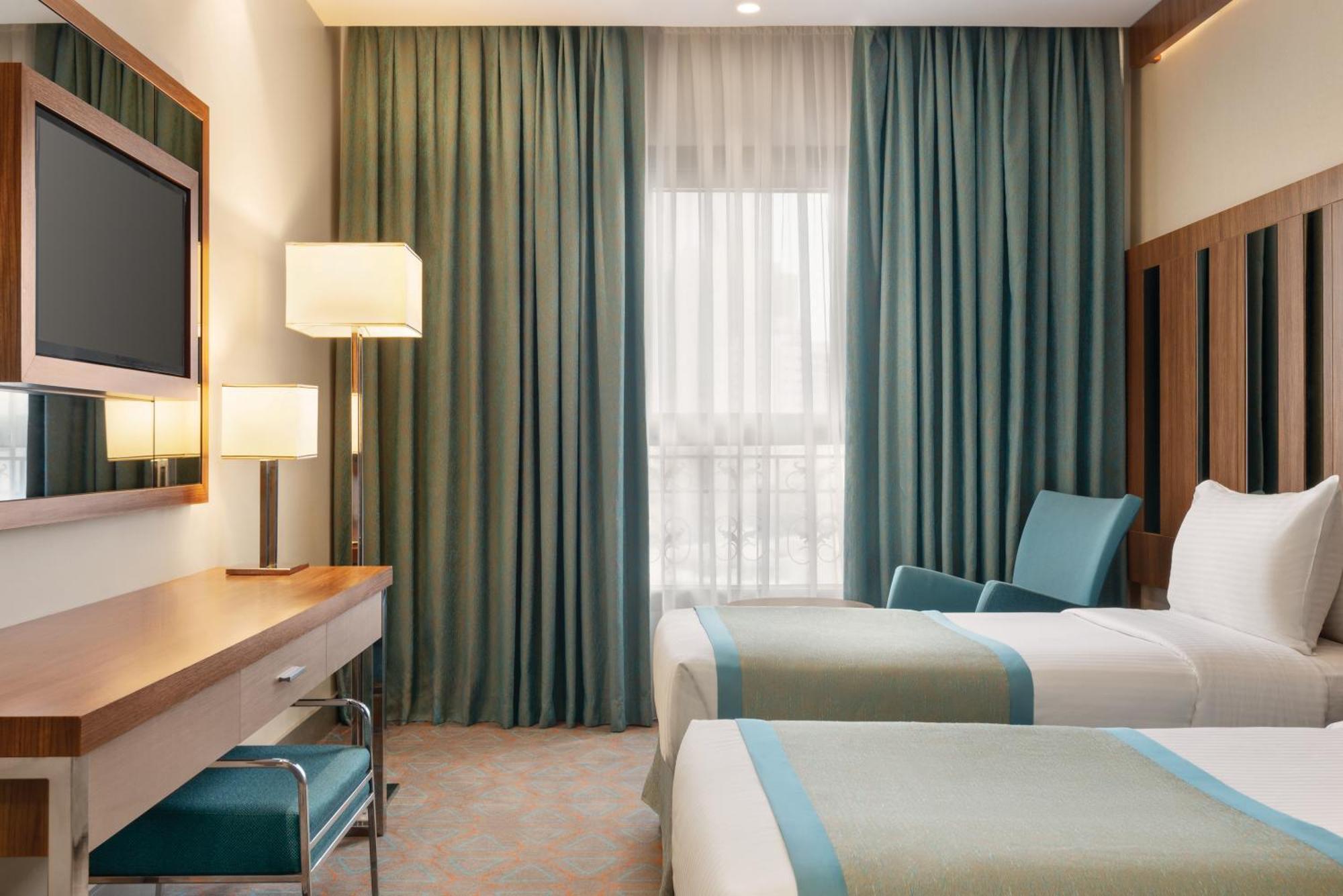 Ramada By Wyndham Makkah Zad Al Tayseer Мекка Экстерьер фото
