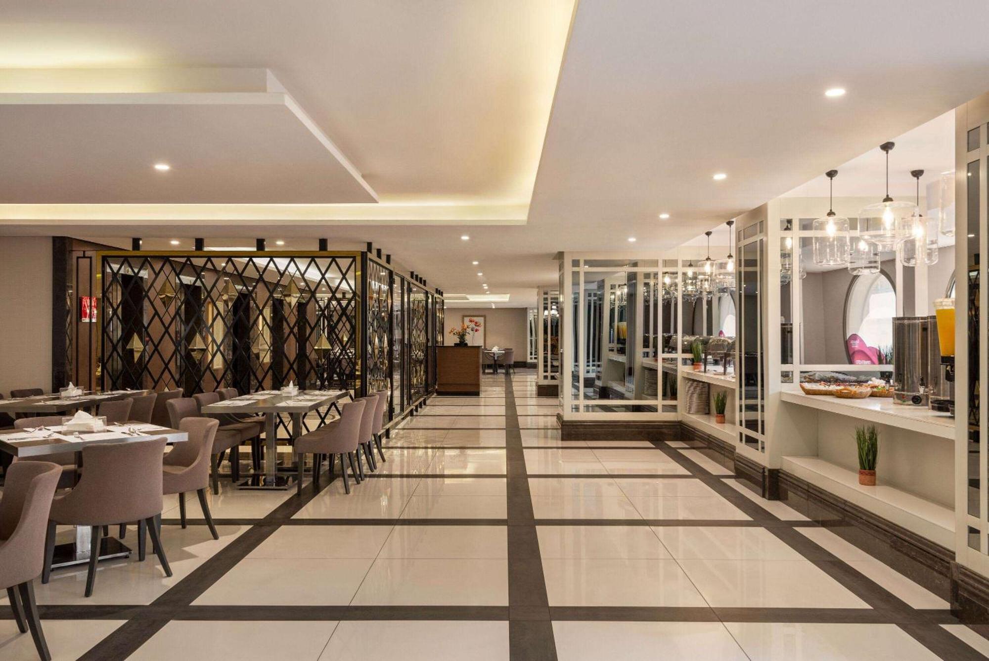 Ramada By Wyndham Makkah Zad Al Tayseer Мекка Экстерьер фото
