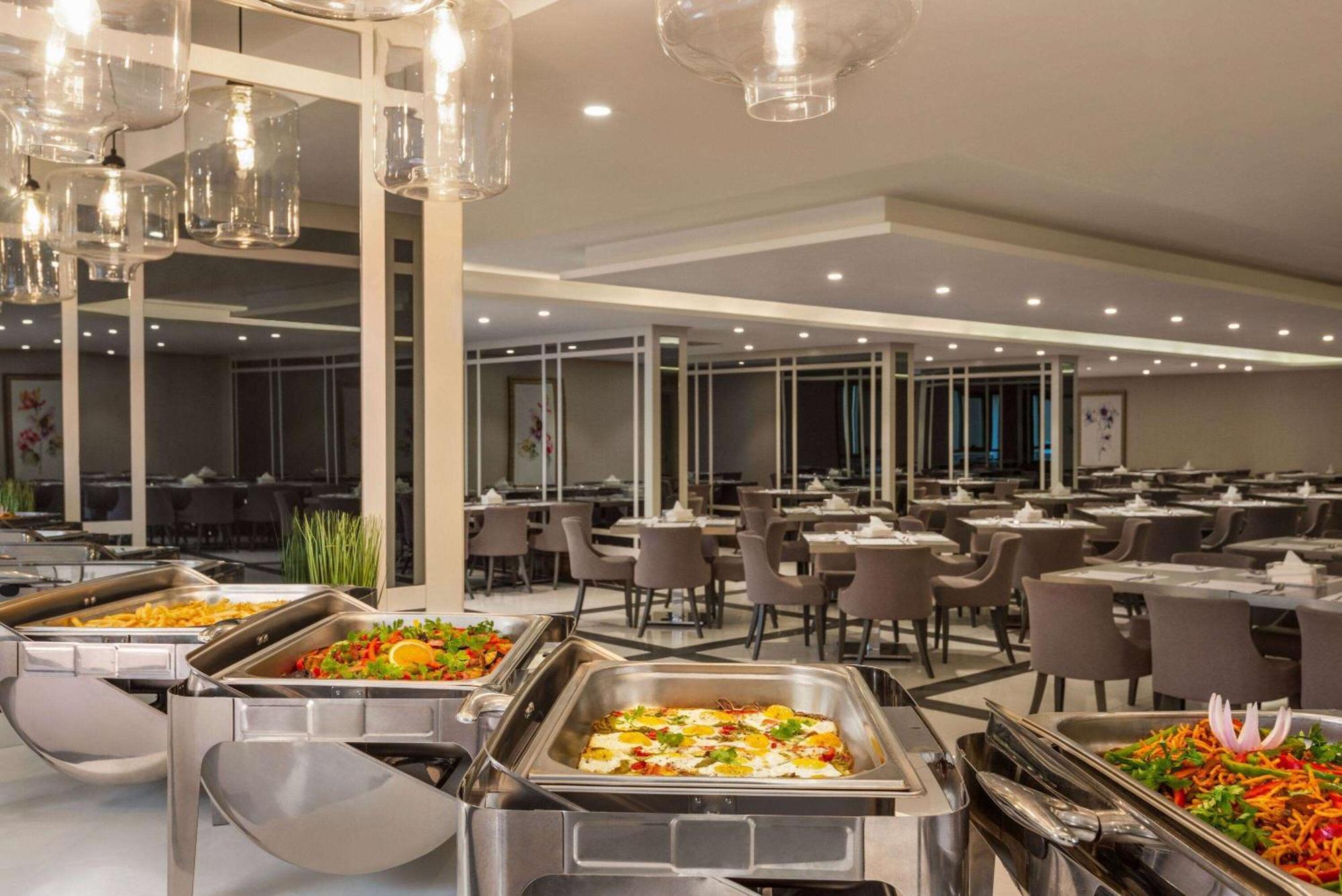 Ramada By Wyndham Makkah Zad Al Tayseer Мекка Экстерьер фото