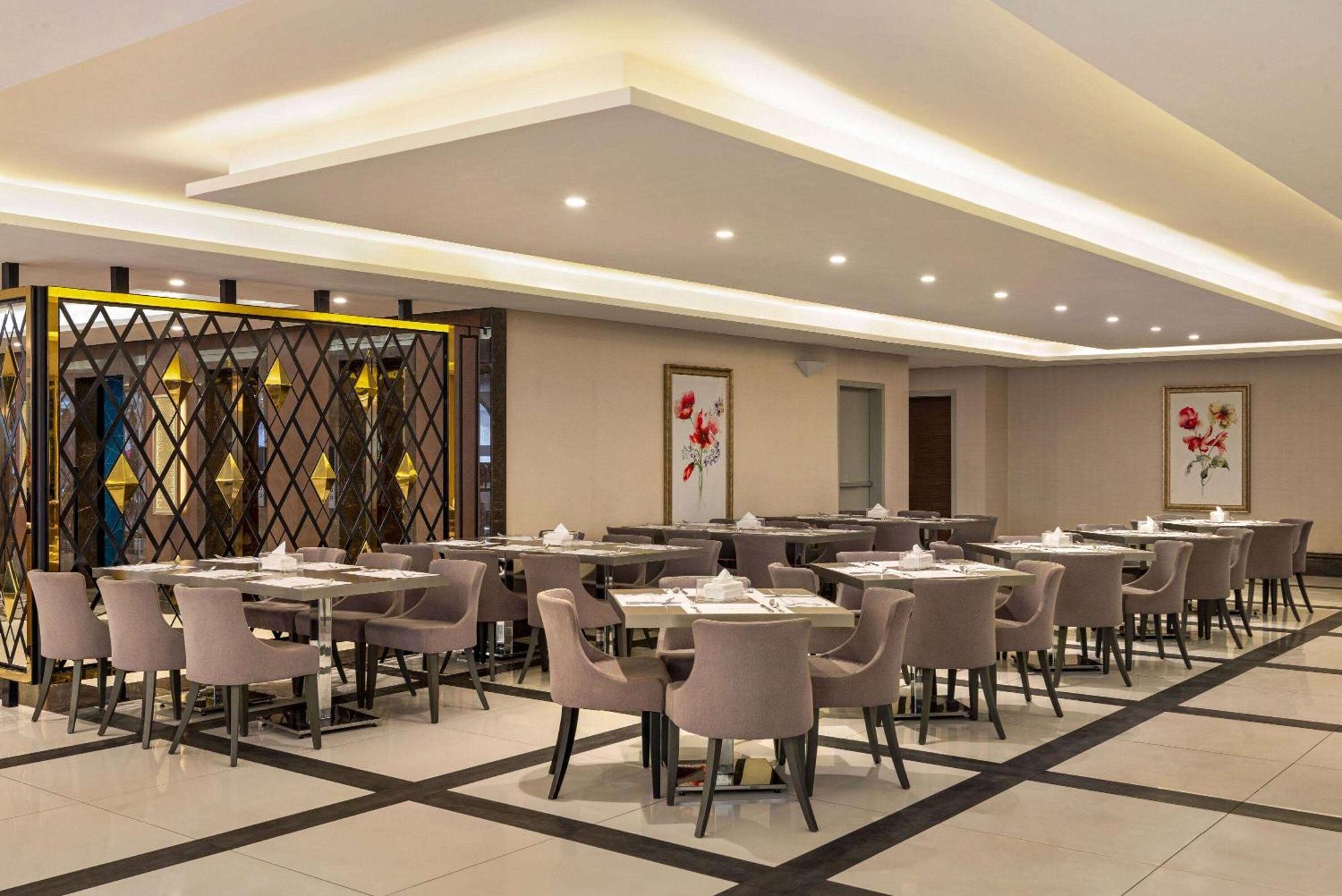 Ramada By Wyndham Makkah Zad Al Tayseer Мекка Экстерьер фото